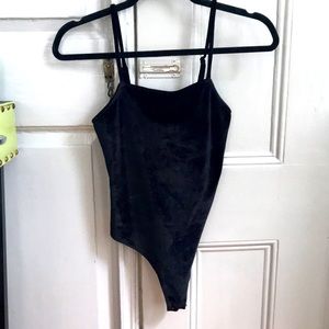 Black velvety body suit, never worn